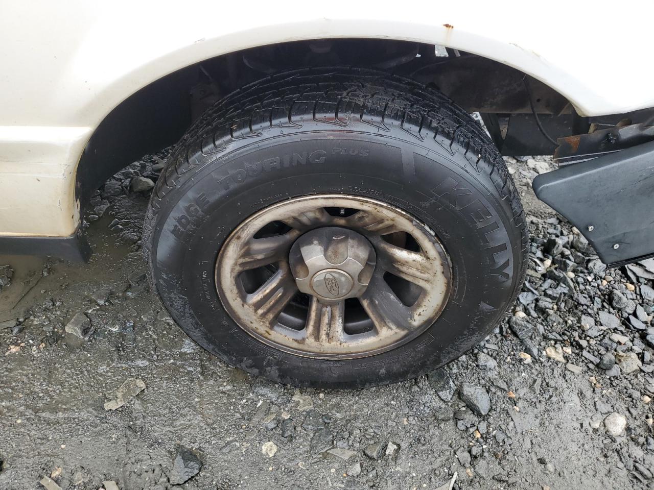 2008 Ford Ranger White vin: 1FTYR10D28PA97321 Damage: Right Front Wheel, Corrosion, > 12 Inches