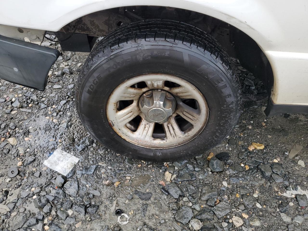 2008 Ford Ranger White vin: 1FTYR10D28PA97321 Damage: Left Front Wheel, Corrosion, > 12 Inches