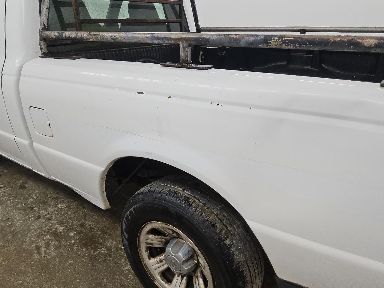 2008 Ford Ranger White vin: 1FTYR10D58PA50056 Damage: Left Qtr Panel, Dent(S) W/ Paint Dmg, 5 To 6 Inches