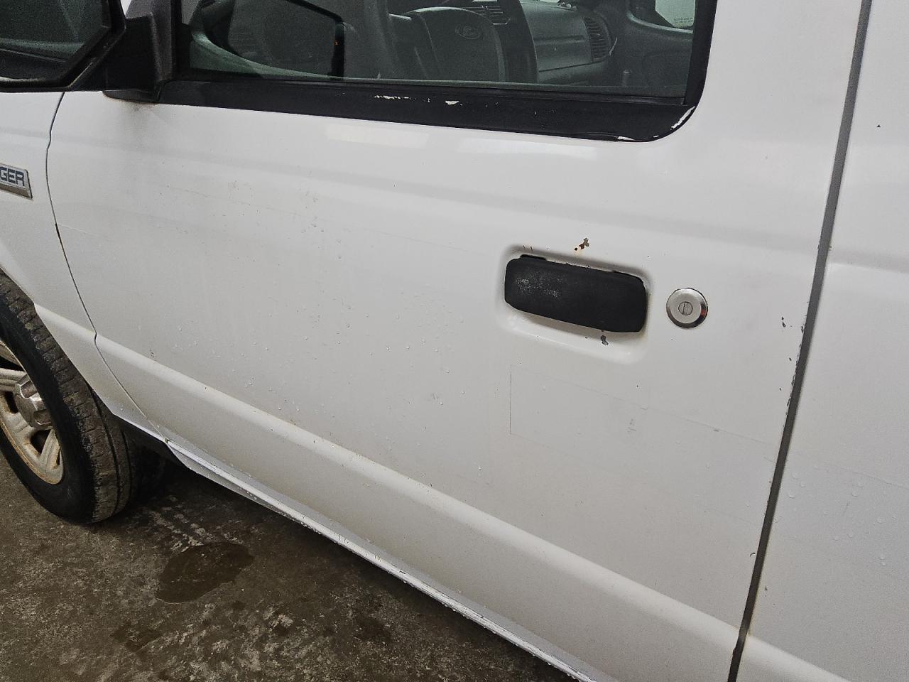 2008 Ford Ranger White vin: 1FTYR10D58PA50056 Damage: Left Front Door, Chipped, 3
