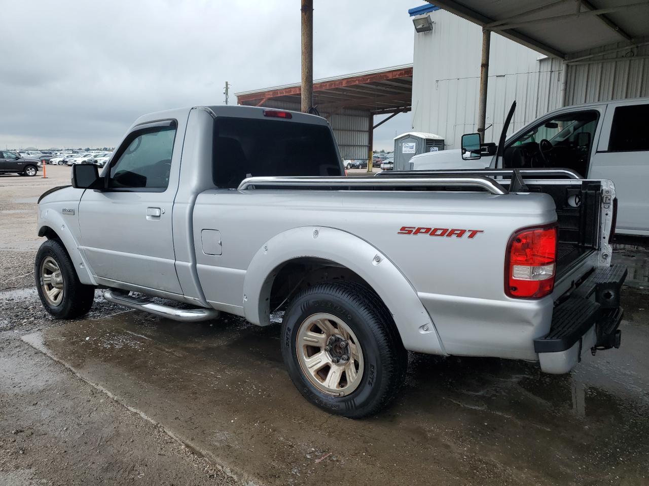 2009 Ford Ranger Silver vin: 1FTYR10D69PA59012 Damage: Left Front Door, Dent(S) W/ Paint Dmg, 2 To 3 Inches