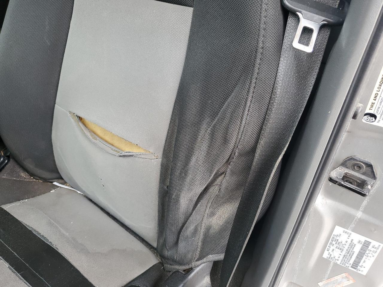 2009 Ford Ranger Silver vin: 1FTYR10D69PA59012 Damage: Left Front Seat Back, Torn, > 12 Inches