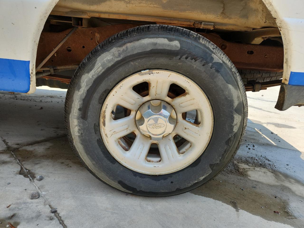 2008 Ford Ranger White vin: 1FTYR10D98PA74179 Damage: Left Rear Wheel, Curb Rash, > 12 Inches