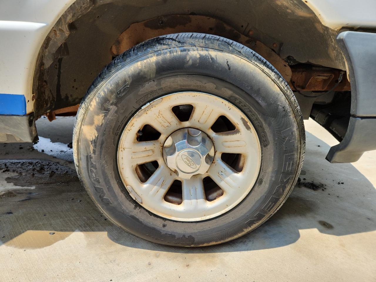 2008 Ford Ranger White vin: 1FTYR10D98PA74179 Damage: Right Front Wheel, Corrosion, > 12 Inches