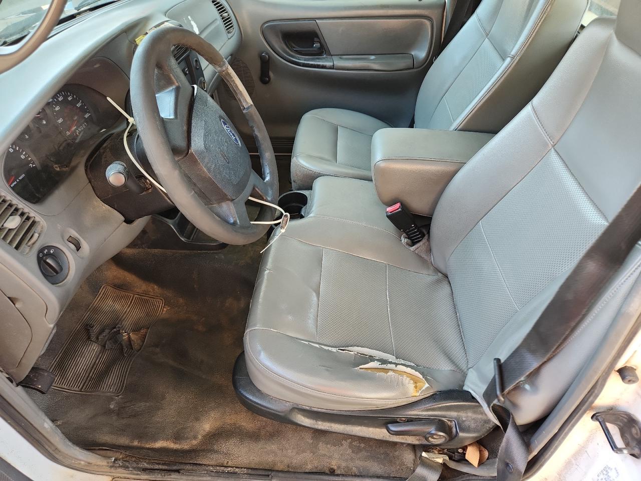 2008 Ford Ranger White vin: 1FTYR10D98PA74179 Damage: Steering Wheel, Worn, Replacement Required