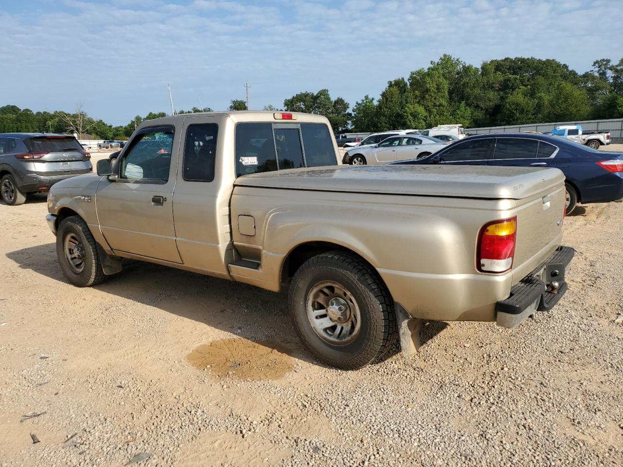 1999 Ford Ranger Super Cab Tan vin: 1FTYR14V7XPA20462