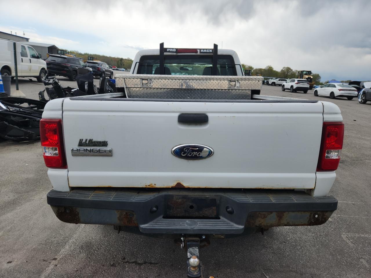 2009 Ford Ranger Super Cab Белый vin: 1FTYR15E99PA35627 Damage: Tailgate, Rust, > 12 Inches