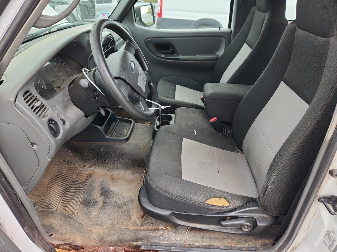 2009 Ford Ranger Super Cab Белый vin: 1FTYR15E99PA35627 Damage: Left Front Seat, Torn, 7 To 8 Inches