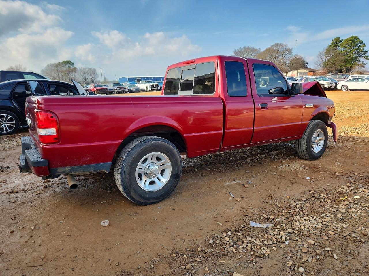 2009 Ford Ranger Super Cab Red vin: 1FTYR44E39PA41099