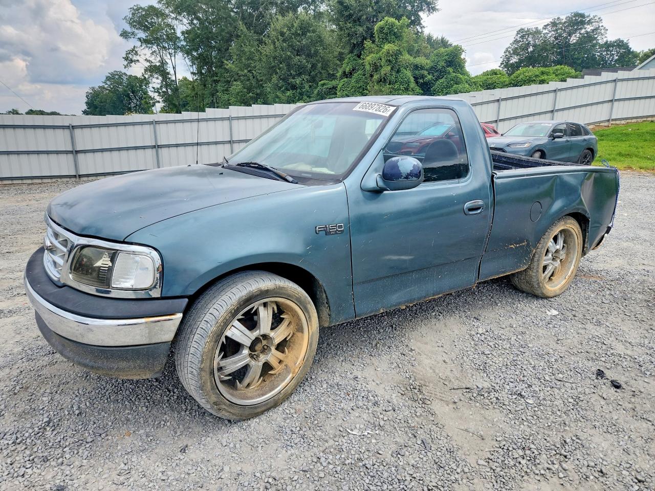 1999 Ford F150 Blue vin: 1FTZF1729XNA68877