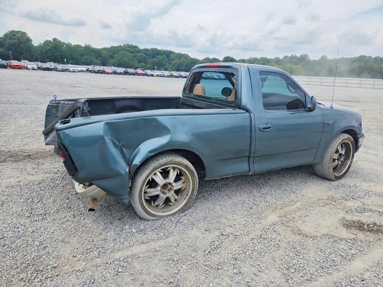 1999 Ford F150 Blue vin: 1FTZF1729XNA68877