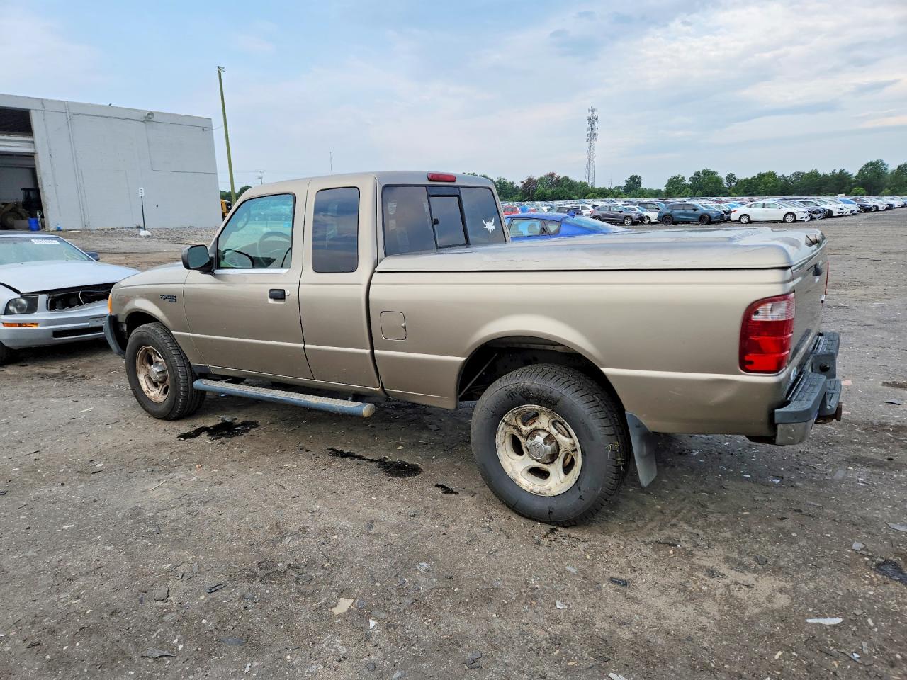 2005 Ford Ranger Super Cab Tan vin: 1FTZR45EX5PA09215