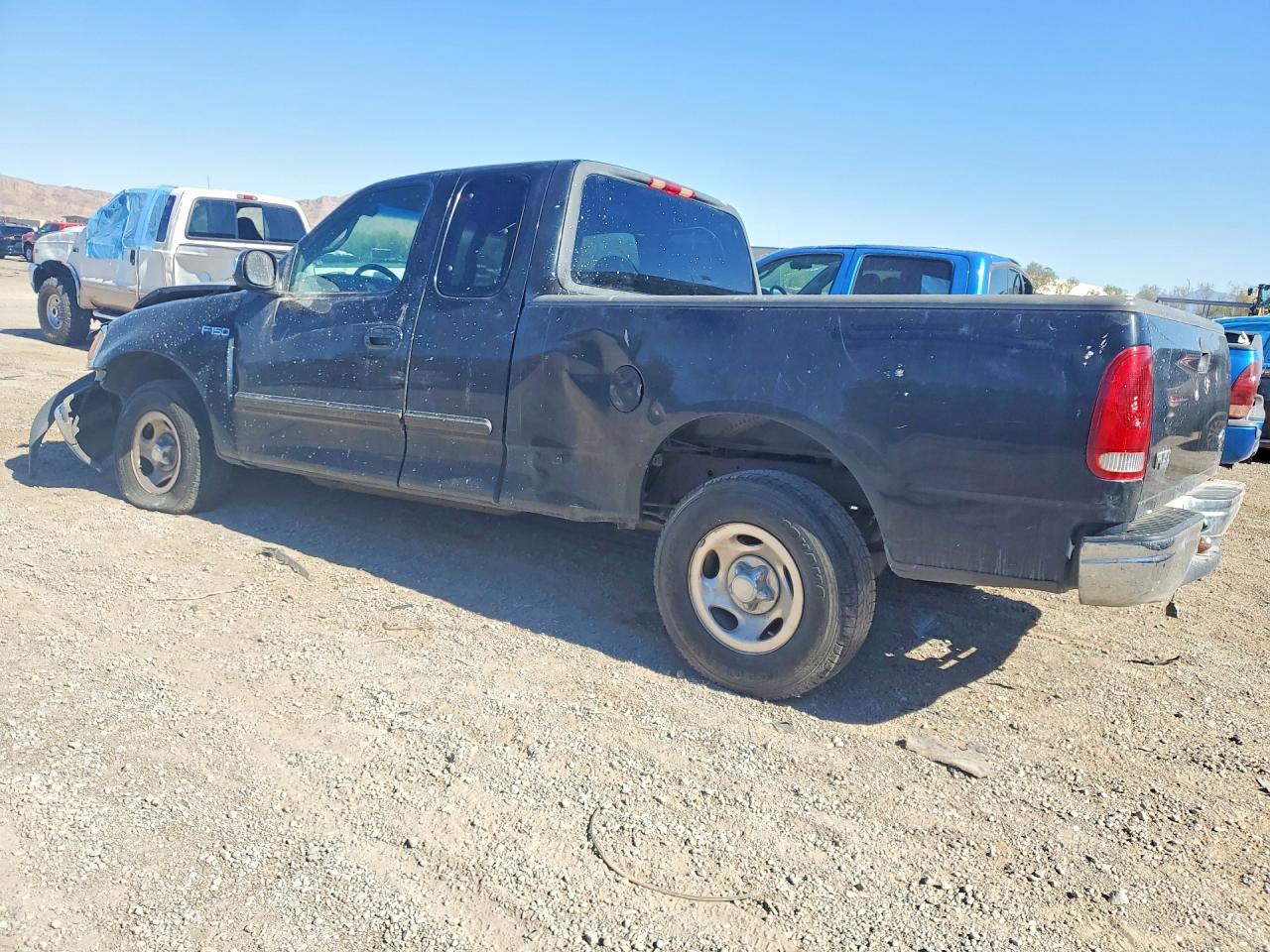 2000 Ford F150 Black vin: 1FTZX1721YNC10959