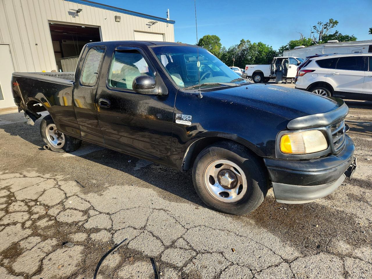 1999 Ford F150 Black vin: 1FTZX172XXKB77962