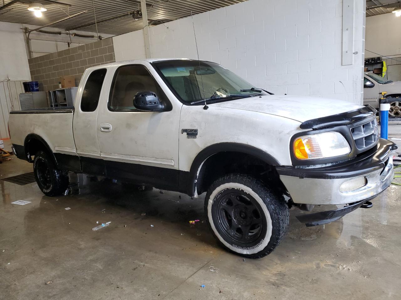 1998 Ford F150 White vin: 1FTZX18W3WKB45547 Damage: Front Bumper Molding, Broken, Replacement Required
