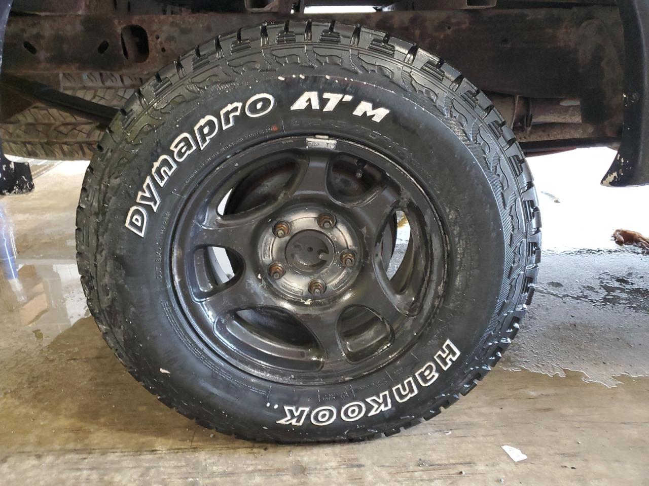 1998 Ford F150 White vin: 1FTZX18W3WKB45547 Damage: Right Rear Wheel, Curb Rash, 4 To 5 Inches