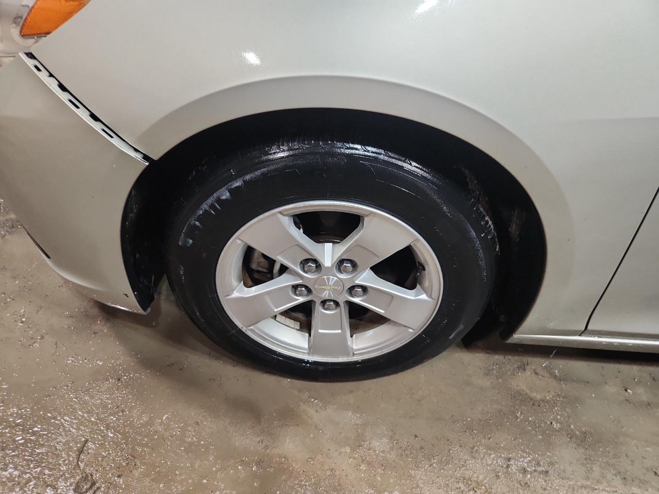 2014 Chevrolet Malibu Ls Silver vin: 1G11B5SL7EF118434 Damage: Left Front Wheel, Curb Rash, 7 To 8 Inches