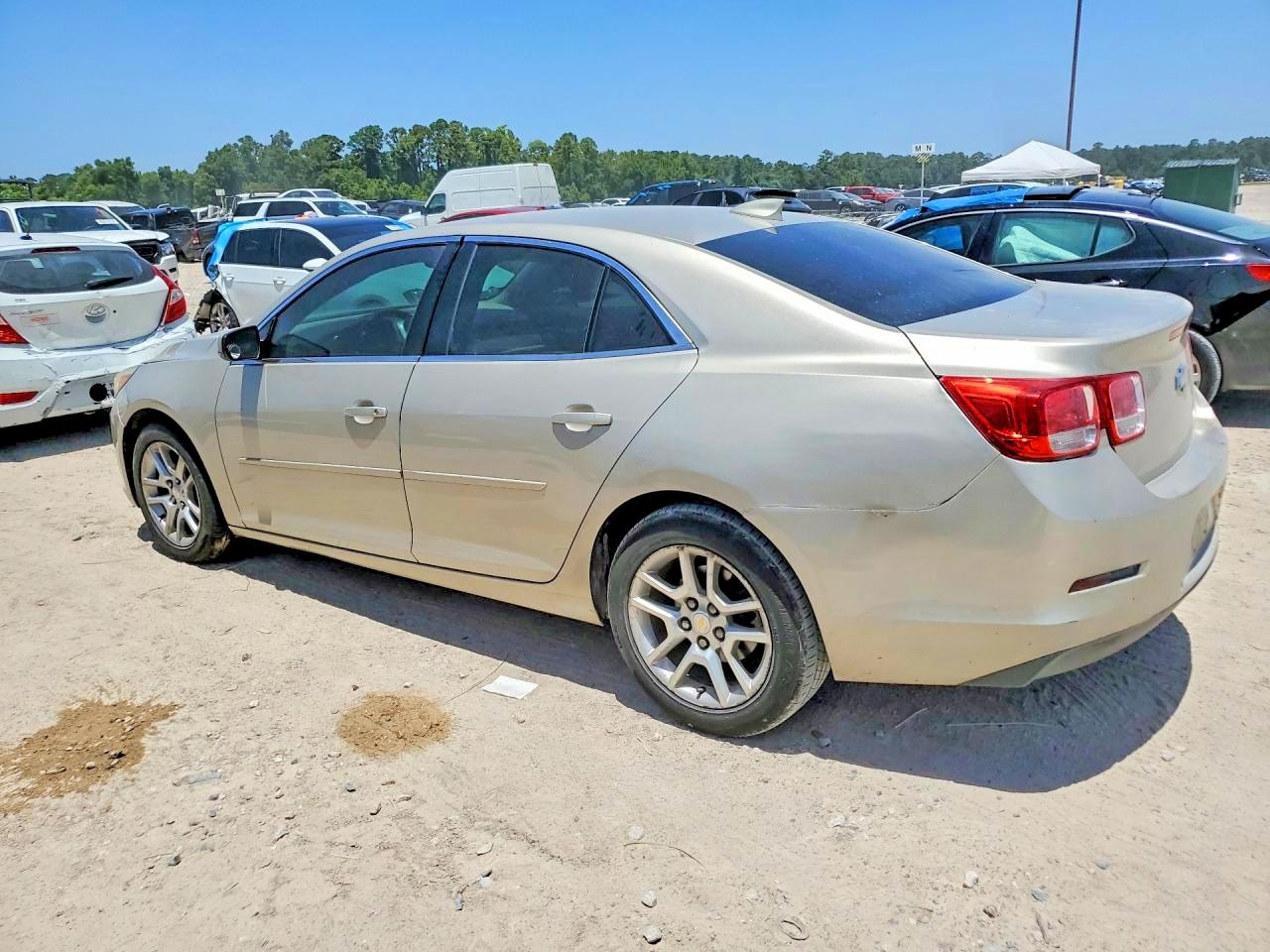 2015 Chevrolet Malibu 1lt Золотой vin: 1G11C5SL4FF309713