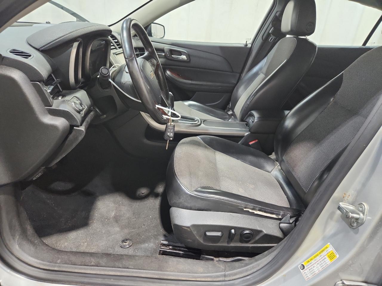 2013 Chevrolet Malibu 2lt Silver vin: 1G11E5SA1DF303602 Damage: Left Front Seat Cushion, Worn, Acceptable