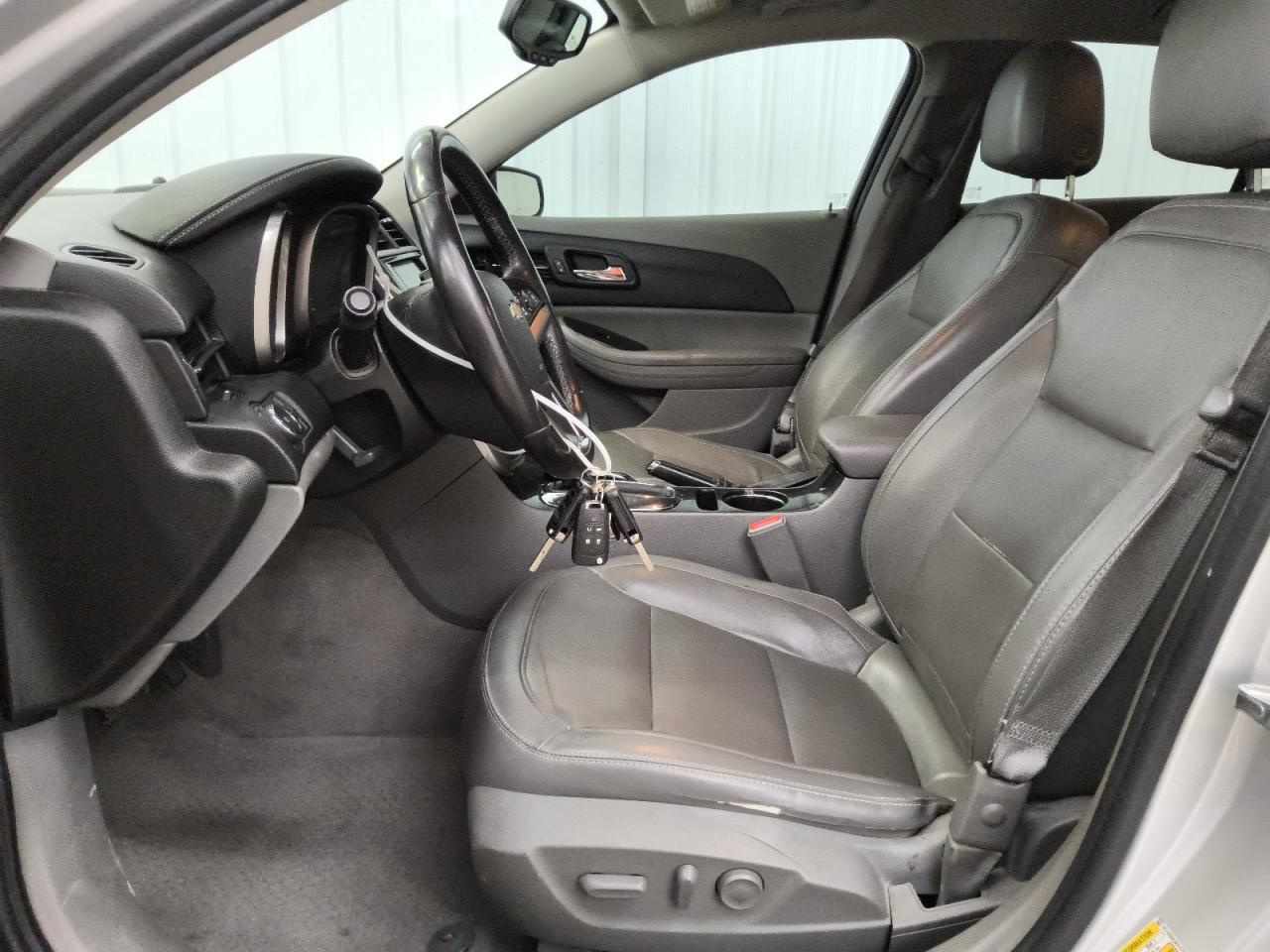 2014 Chevrolet Malibu 2lt Silver vin: 1G11E5SL6EF272592 Damage: Left Front Seat Cushion, Torn, > 12 Inches