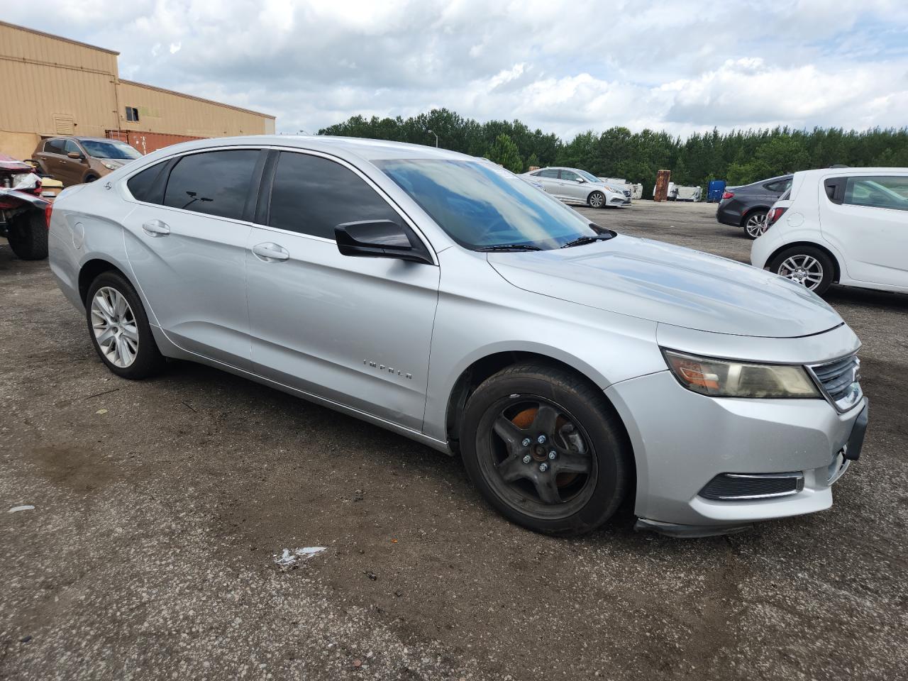 2014 Chevrolet Impala Ls Silver vin: 1G11Y5SL2EU104676 Damage: Right Head Lamp, Faded, Repair Required