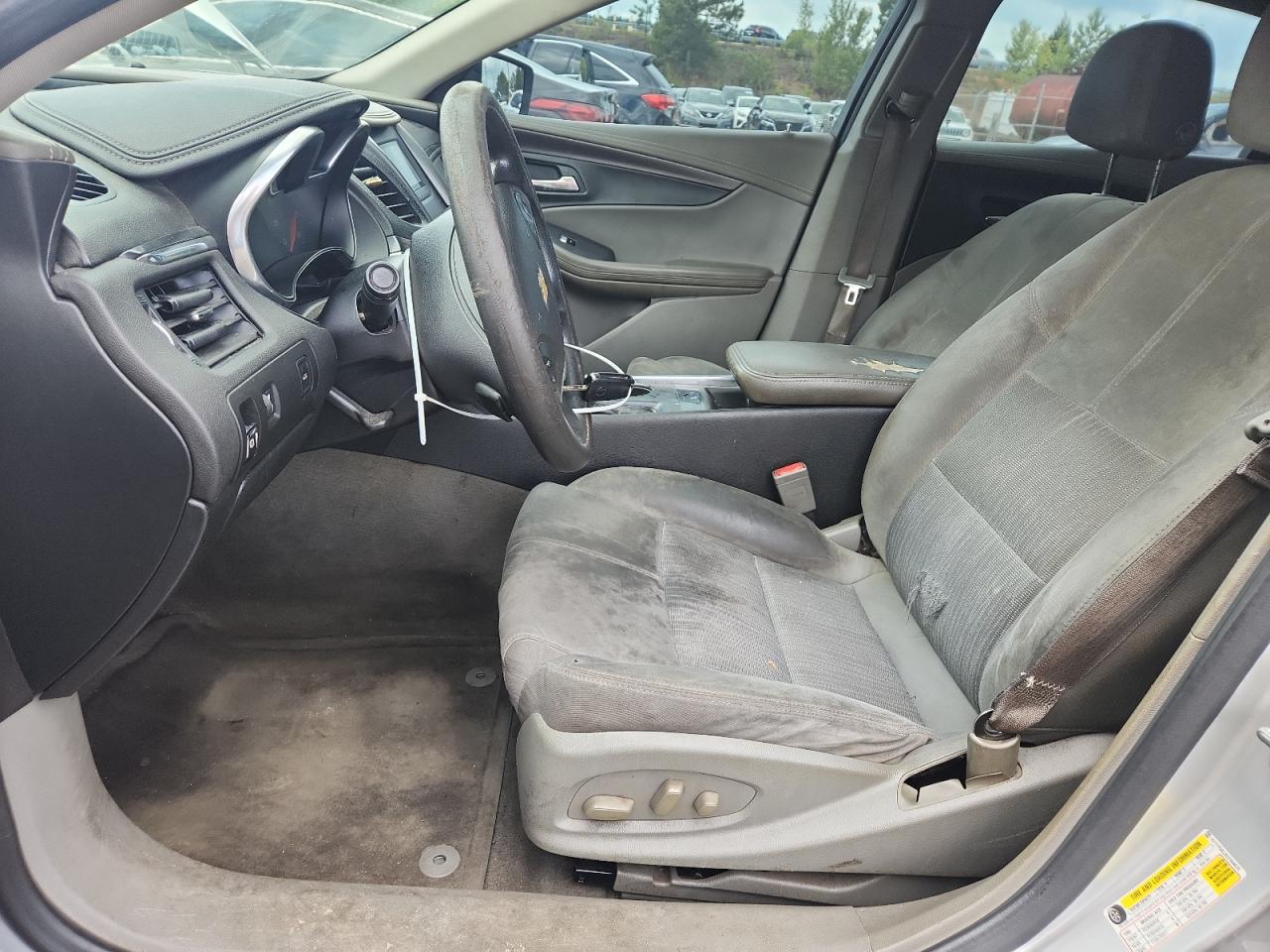 2014 Chevrolet Impala Ls Silver vin: 1G11Y5SL2EU104676 Damage: Left Front Seat, Worn, Replacement Required