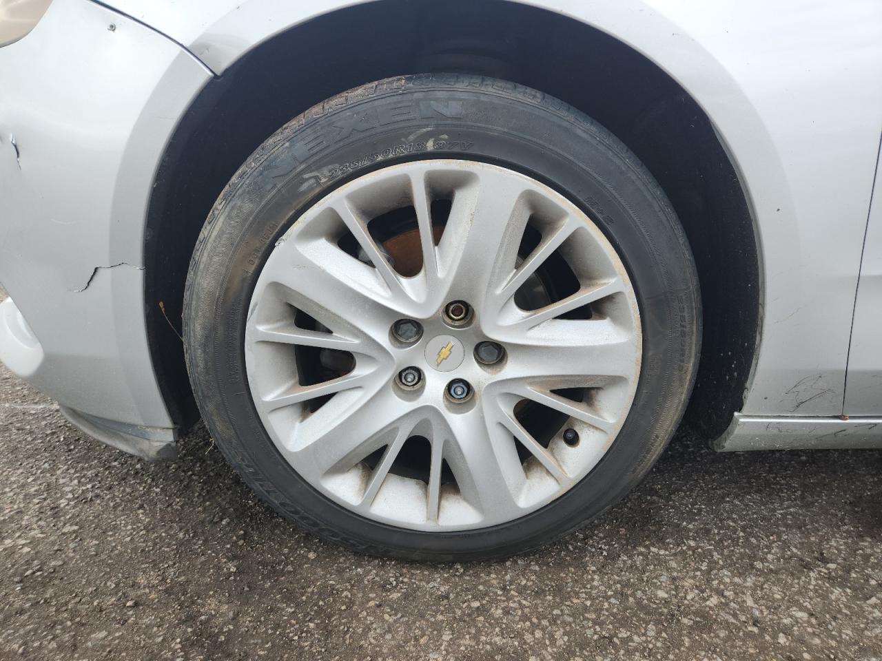2014 Chevrolet Impala Ls Silver vin: 1G11Y5SL2EU104676 Damage: Left Front Wheel, Curb Rash, > 12 Inches