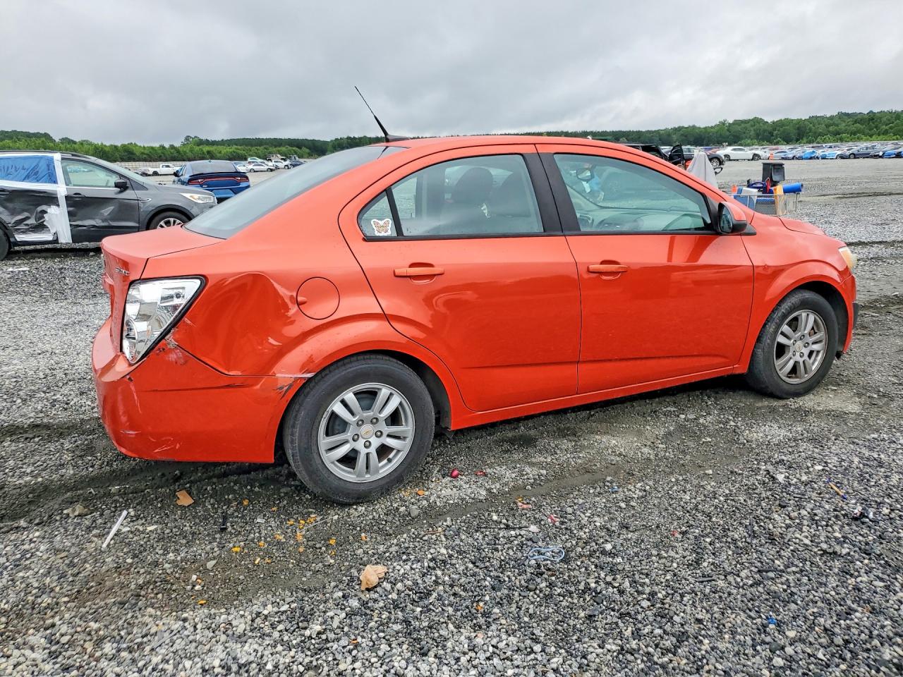 2012 Chevrolet Sonic Ls Orange vin: 1G1JA5SH2C4147914