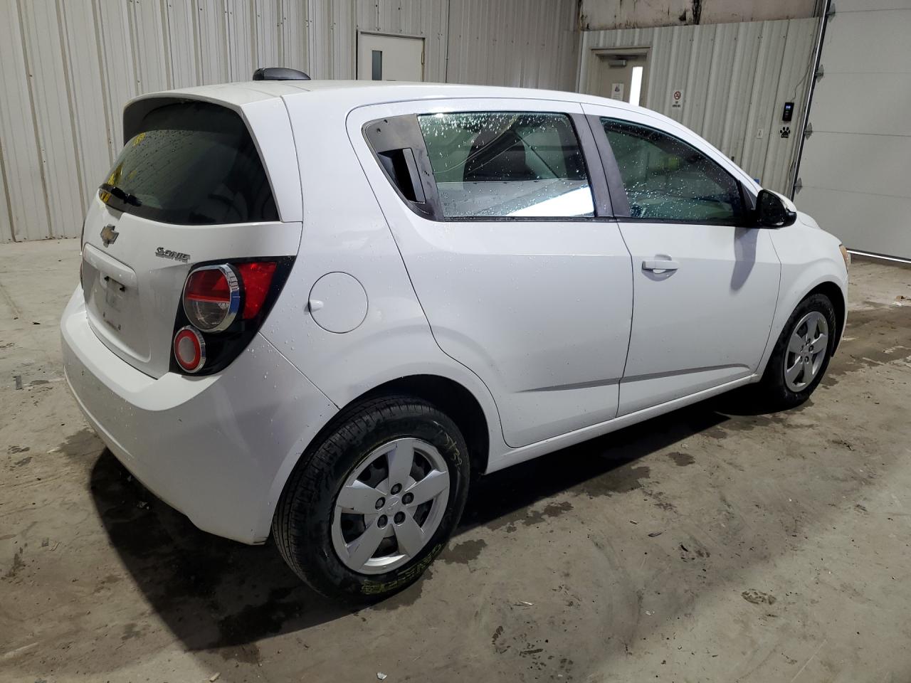 2015 Chevrolet Sonic Ls White vin: 1G1JA6SG3F4185136 Damage: Right Qtr Panel, Dent(S) W/No Paint Dmg, 1/2 To 1 Inch