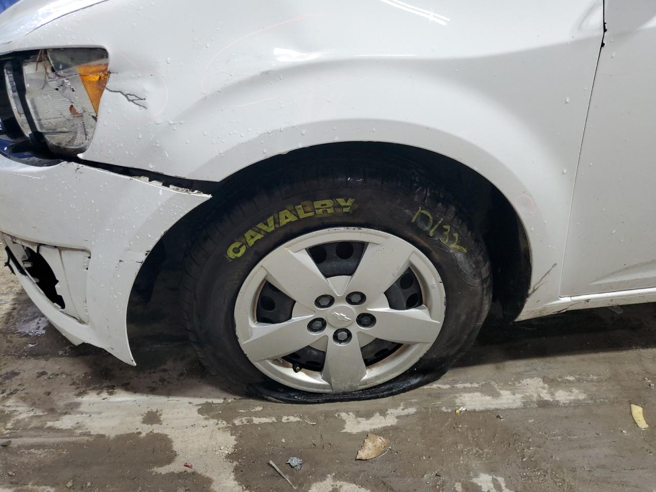 2015 Chevrolet Sonic Ls White vin: 1G1JA6SG3F4185136 Damage: Left Front Tire, Separated, Replacement Required