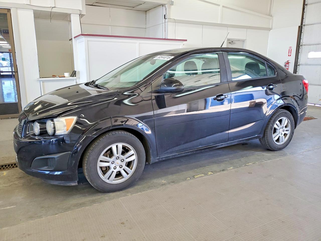 2012 Chevrolet Sonic Ls Black vin: 1G1JB5SH6C4187975