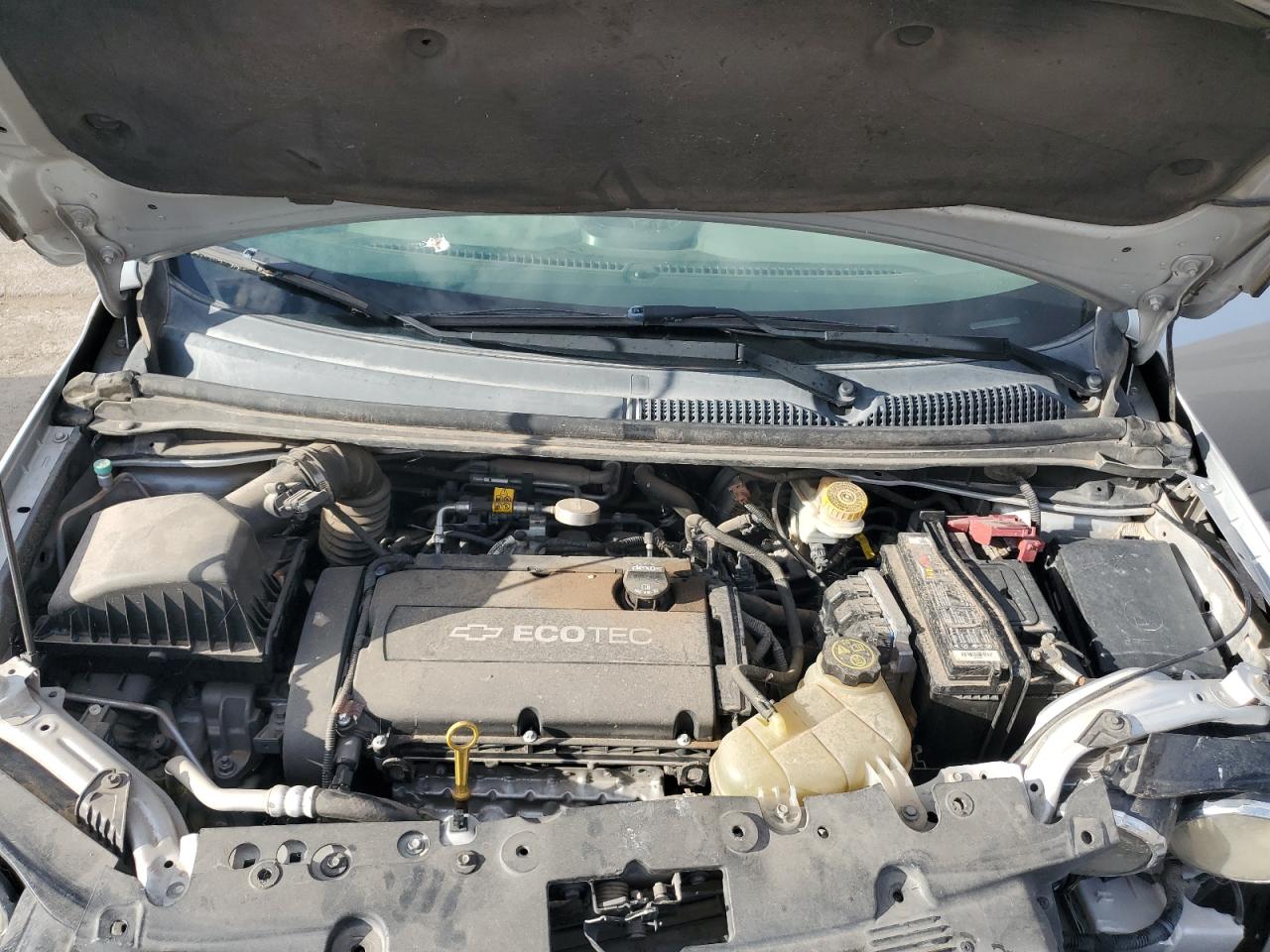 2015 Chevrolet Sonic Lt Silver vin: 1G1JC5SH3F4200506 Damage: Core Support, Kinked, > 12 Inches