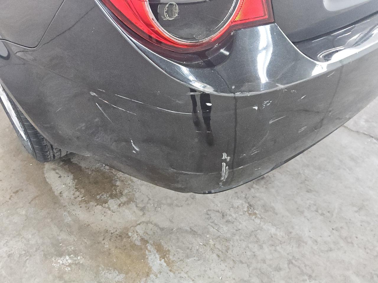 2013 Chevrolet Sonic Lt Black vin: 1G1JC5SH7D4192004 Damage: Rear Bumper, Heavy Scratch, > 12 Inches