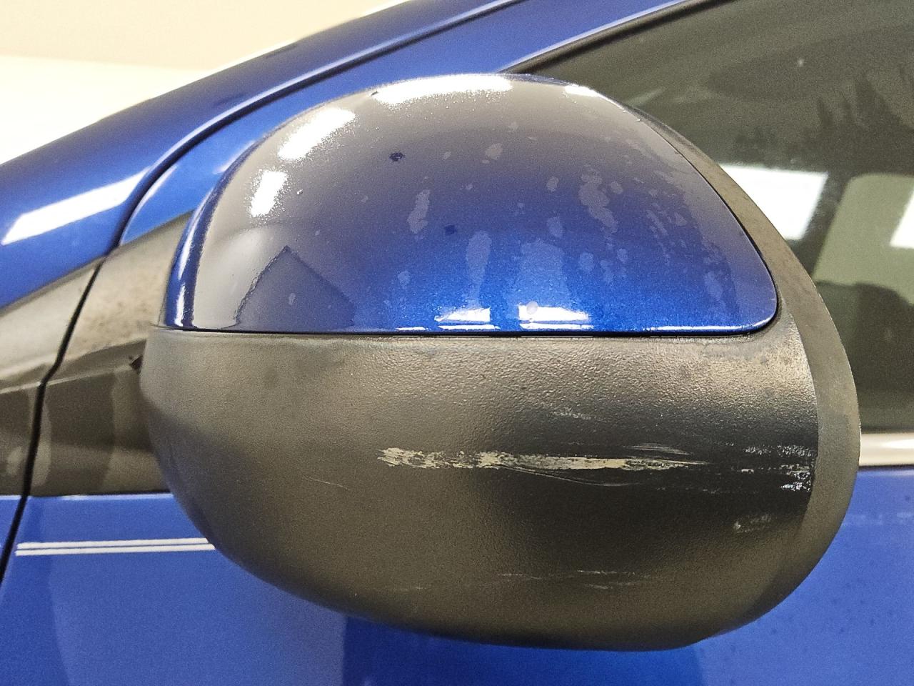 2014 Chevrolet Sonic Ltz Blue vin: 1G1JE6SB7E4189665 Damage: Left Front Mirror Housing, Scraped, 5 To 6 Inches