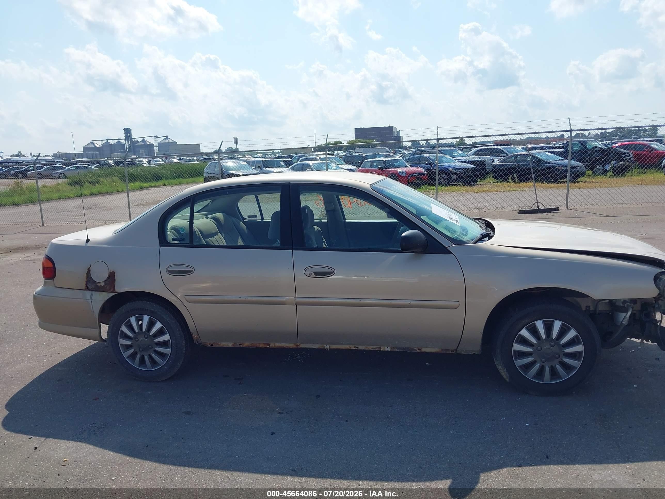 2001 Chevrolet Malibu   Gold vin: 1G1ND52J01M683057