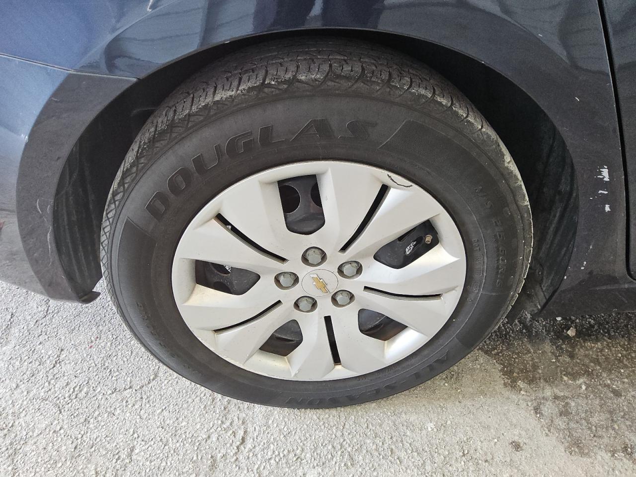 2015 Chevrolet Cruze Ls Blue vin: 1G1PA5SH3F7213934 Damage: Right Rear Wheel Cover, Curb Rash, 2 To 3 Inches