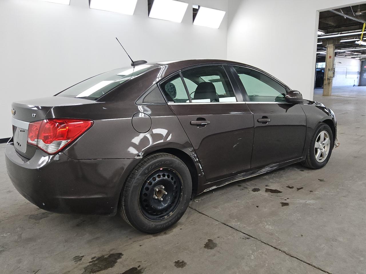 2015 Chevrolet Cruze Lt Brown vin: 1G1PC5SB0F7249134 Damage: Right Rear Wheel, Mismatched, Replacement Required
