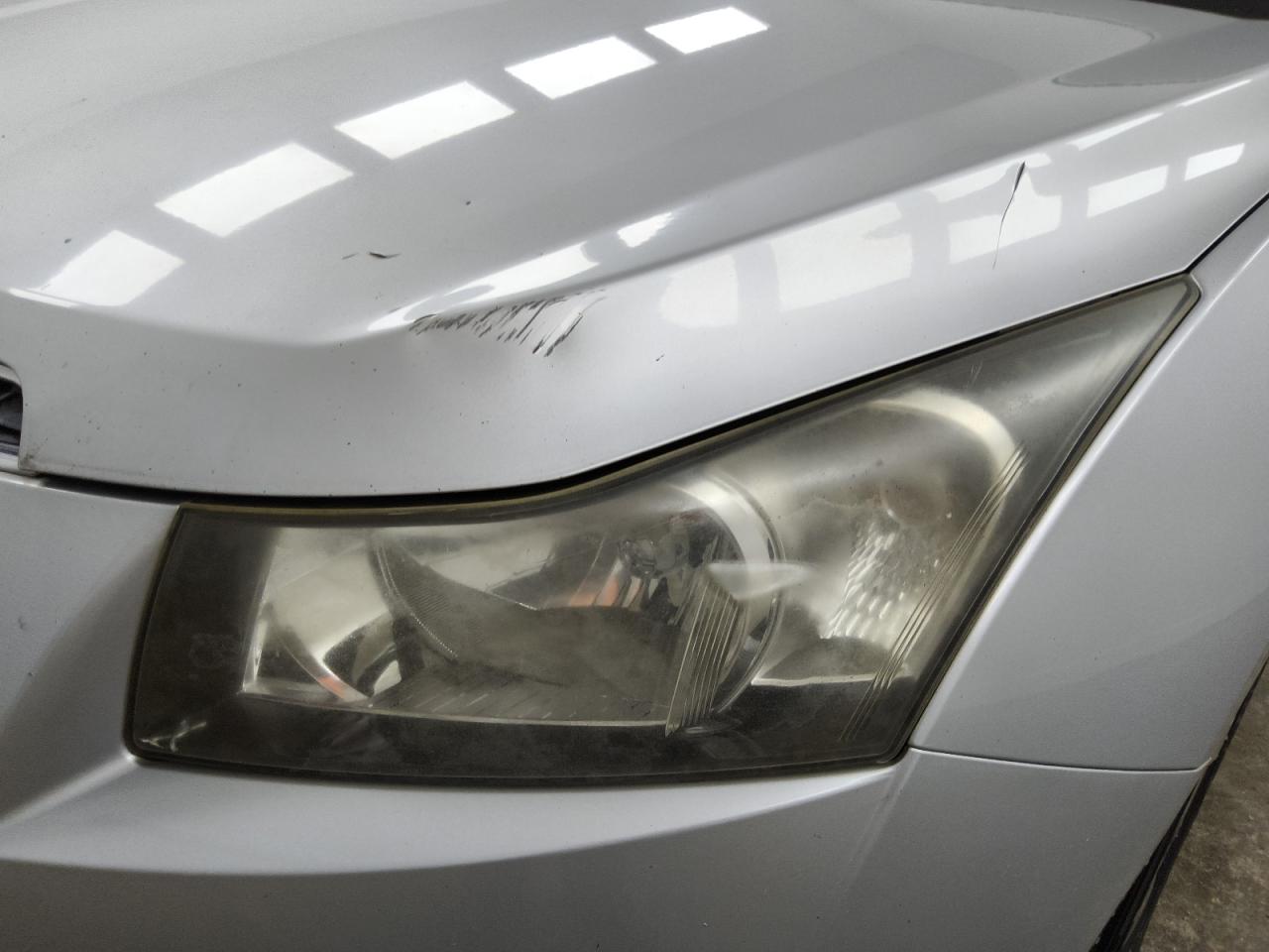 2011 Chevrolet Cruze Ls Silver vin: 1G1PC5SH8B7142766 Damage: Left Head Lamp, Faded, Repair Required