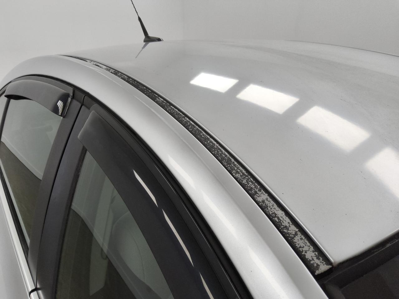 2011 Chevrolet Cruze Ls Silver vin: 1G1PC5SH8B7142766 Damage: Right Drip Rail Molding, Peeling, < 1/8 Inch