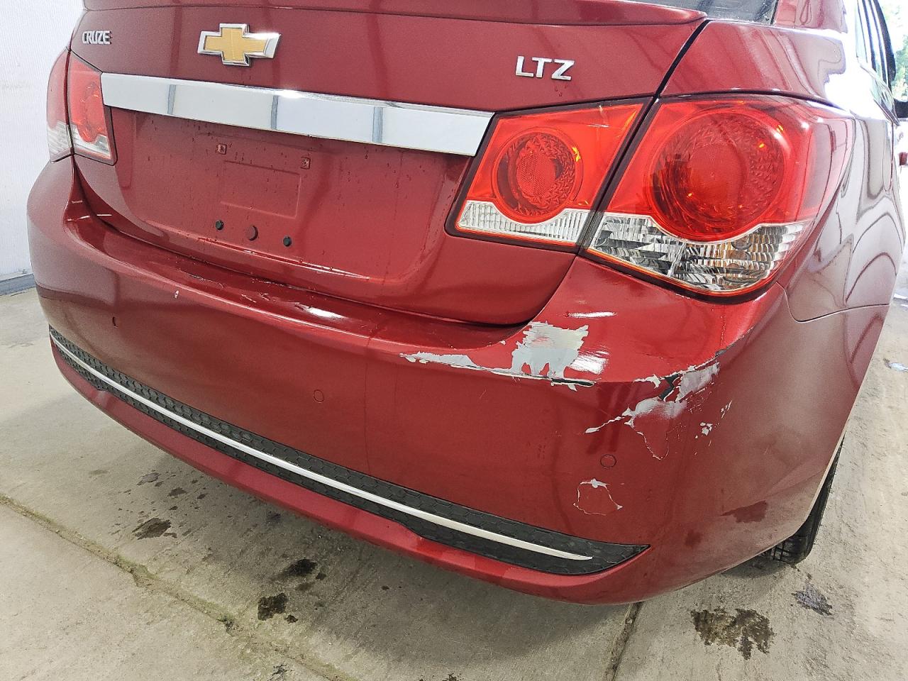 2012 Chevrolet Cruze Ltz Burgundy vin: 1G1PH5SC7C7354033 Damage: Deck Lid, Dent(S) W/ Paint Dmg, 1 To 2 Inches