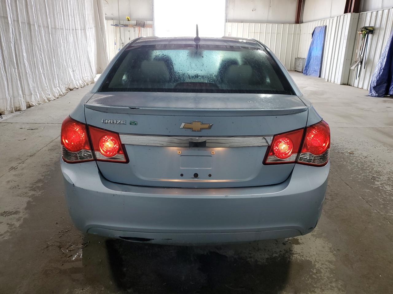 2011 Chevrolet Cruze Eco Blue vin: 1G1PJ5S91B7170827 Damage: Deck Lid, Dent(S) W/ Paint Dmg, 2 To 3 Inches