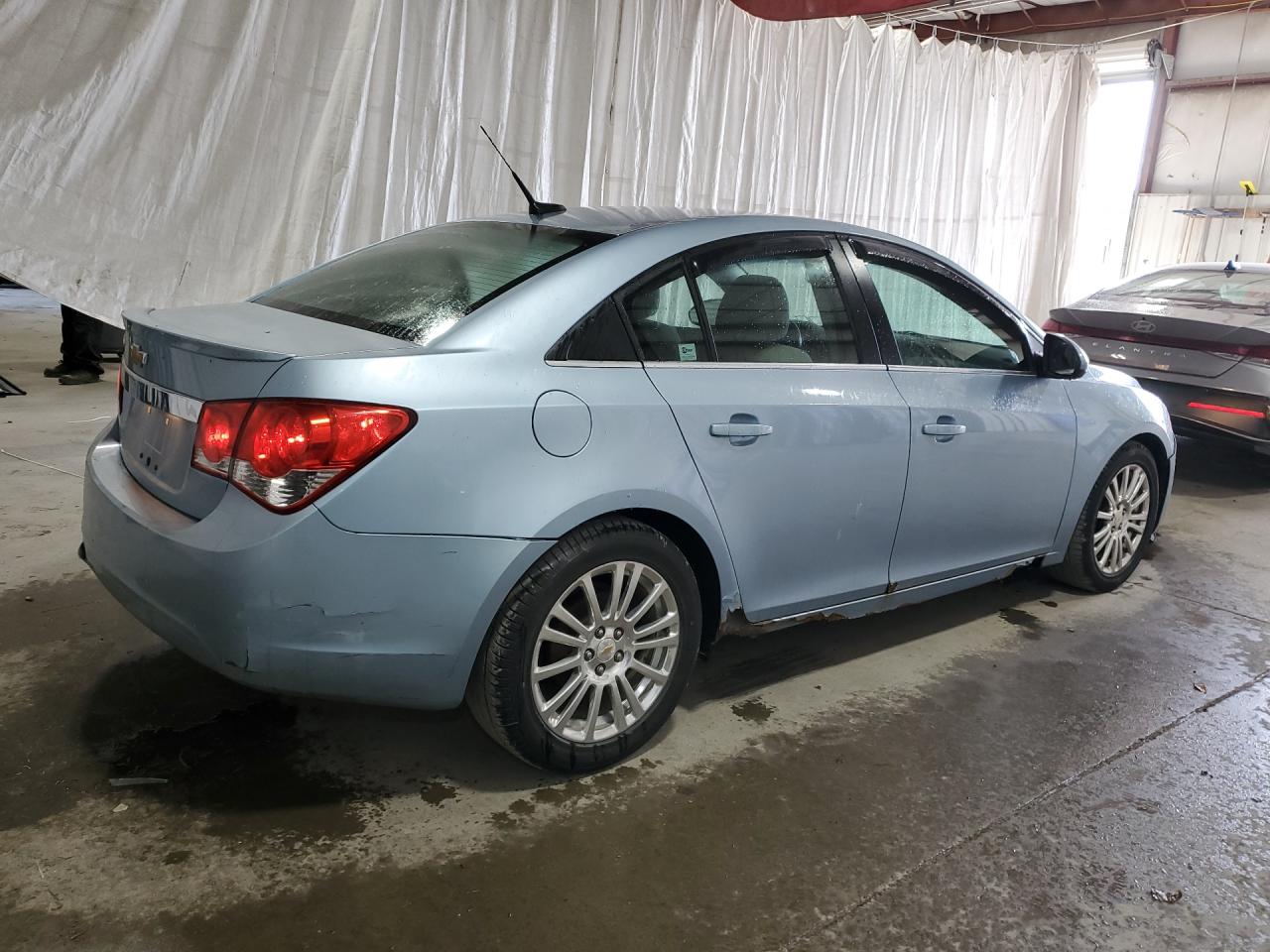 2011 Chevrolet Cruze Eco Blue vin: 1G1PJ5S91B7170827 Damage: Rear Bumper, Broken, Replacement Required