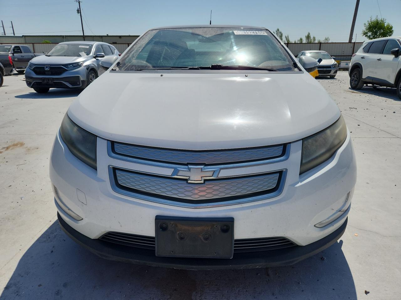 2012 Chevrolet Volt White vin: 1G1RA6E47CU104090 Damage: Left Head Lamp, Faded, Repair Required
