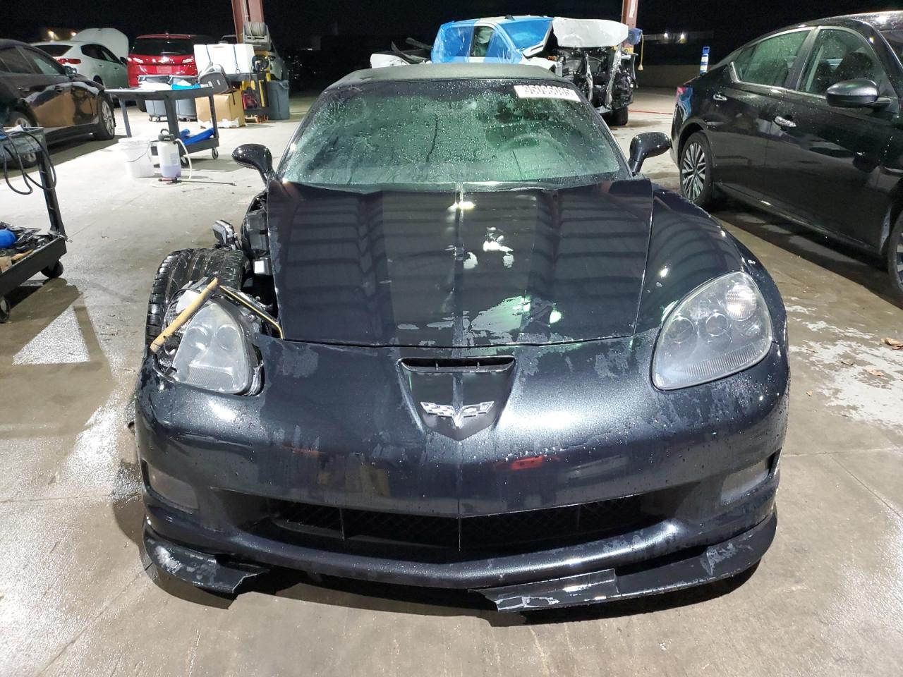 2012 Chevrolet Corvette Grand Sport Black vin: 1G1YW3DW1C5106460 Damage: Left Head Lamp, Faded, Repair Required