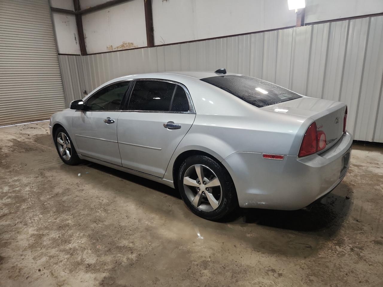 2012 Chevrolet Malibu 2lt Silver vin: 1G1ZD5EU7CF340020 Damage: Left Qtr Panel, Dent(S) W/No Paint Dmg, 1/2 To 1 Inch