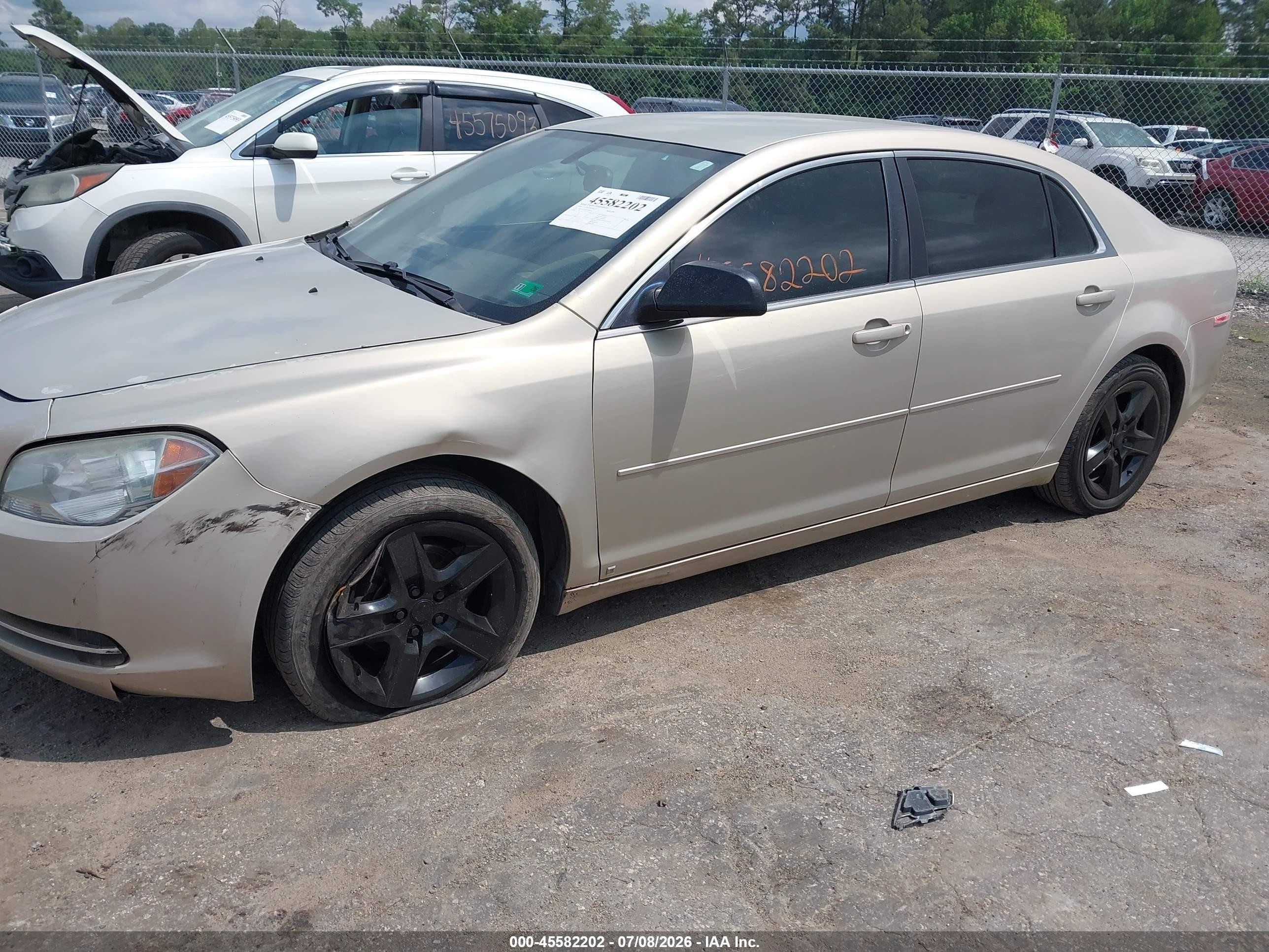 2009 Chevrolet Malibu Ls Gold vin: 1G1ZG57B09F259873