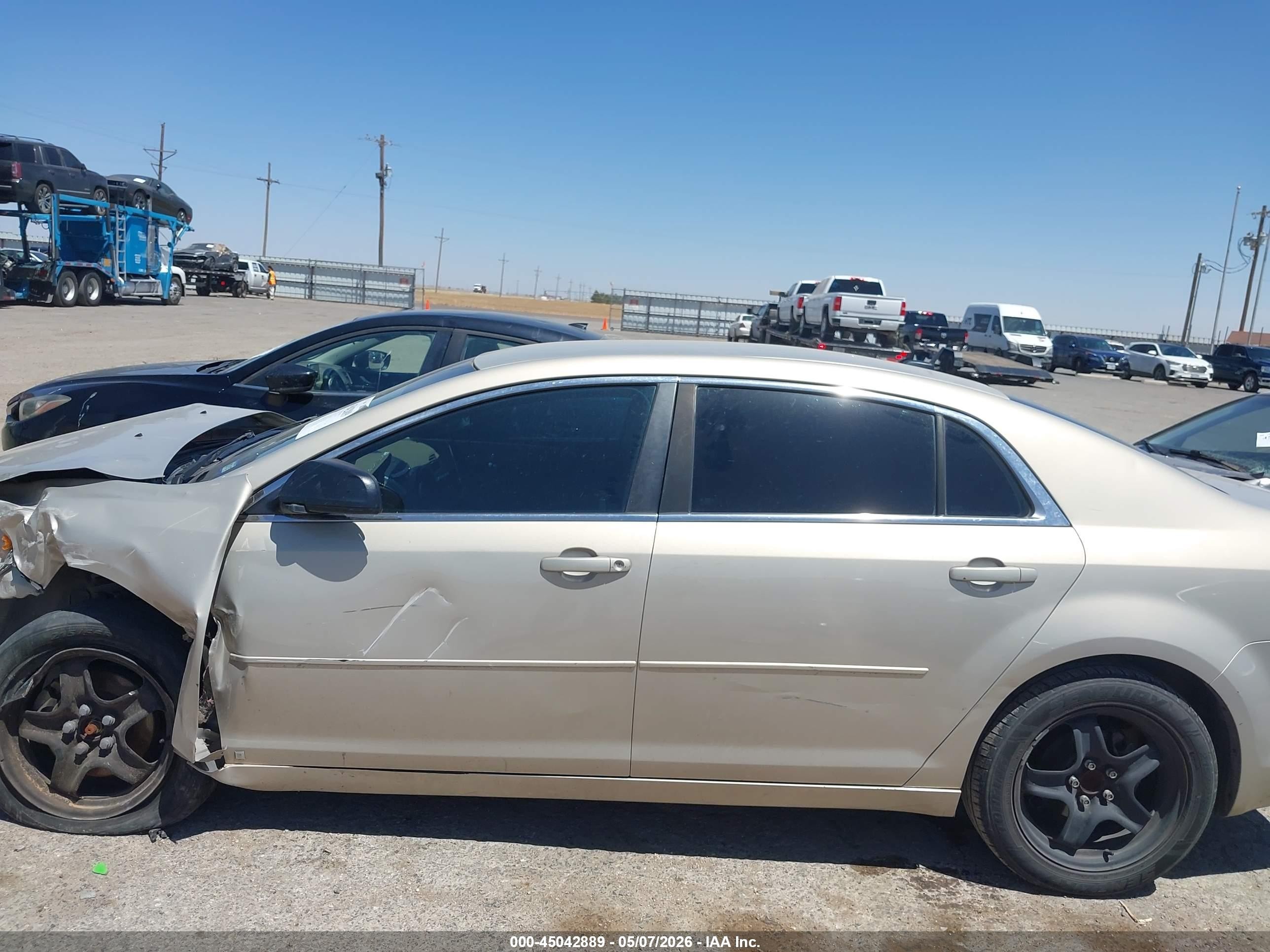 2009 Chevrolet Malibu Ls Золотой vin: 1G1ZG57B394163683