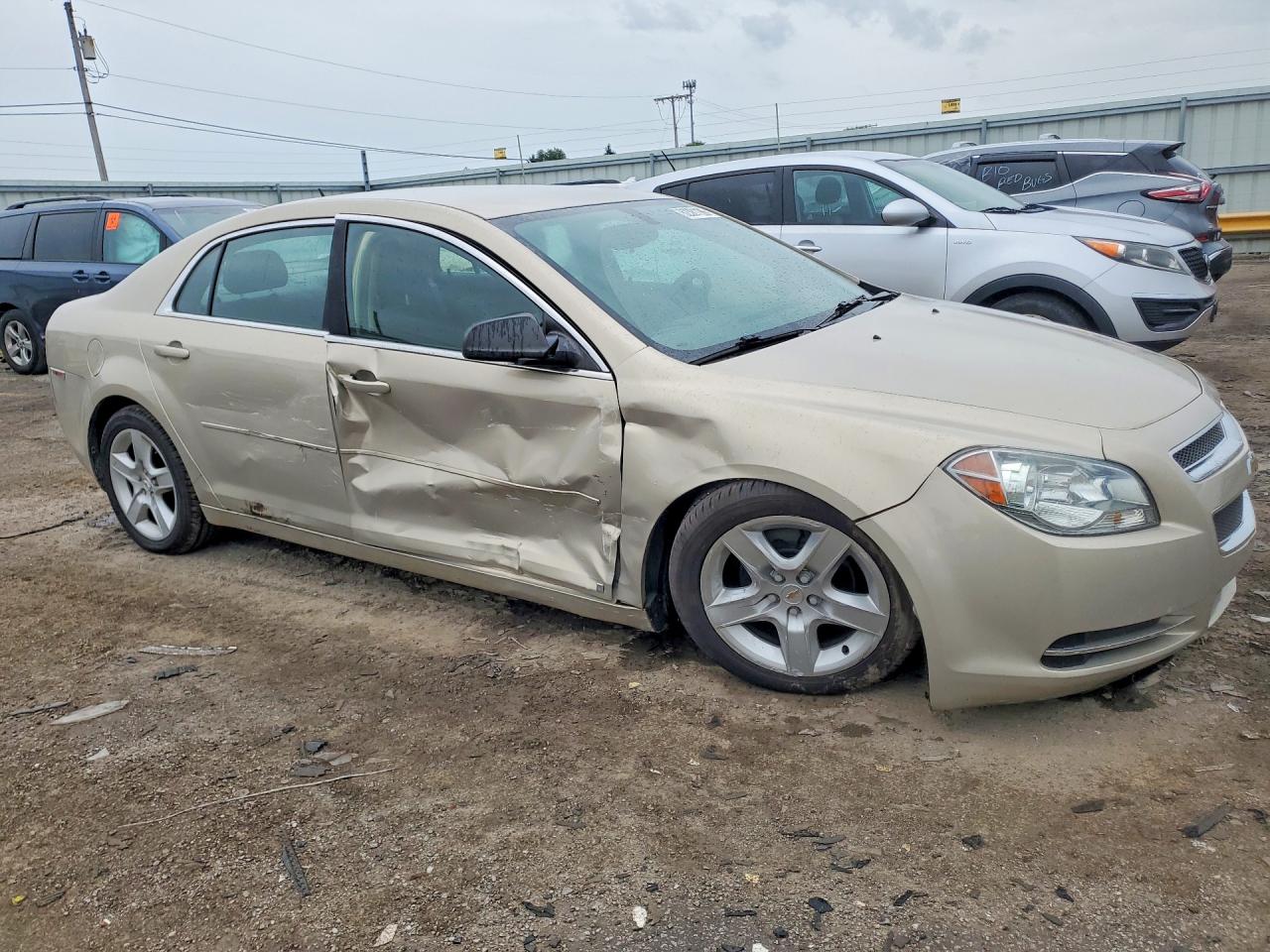 2009 Chevrolet Malibu Ls Gold vin: 1G1ZG57B794201187