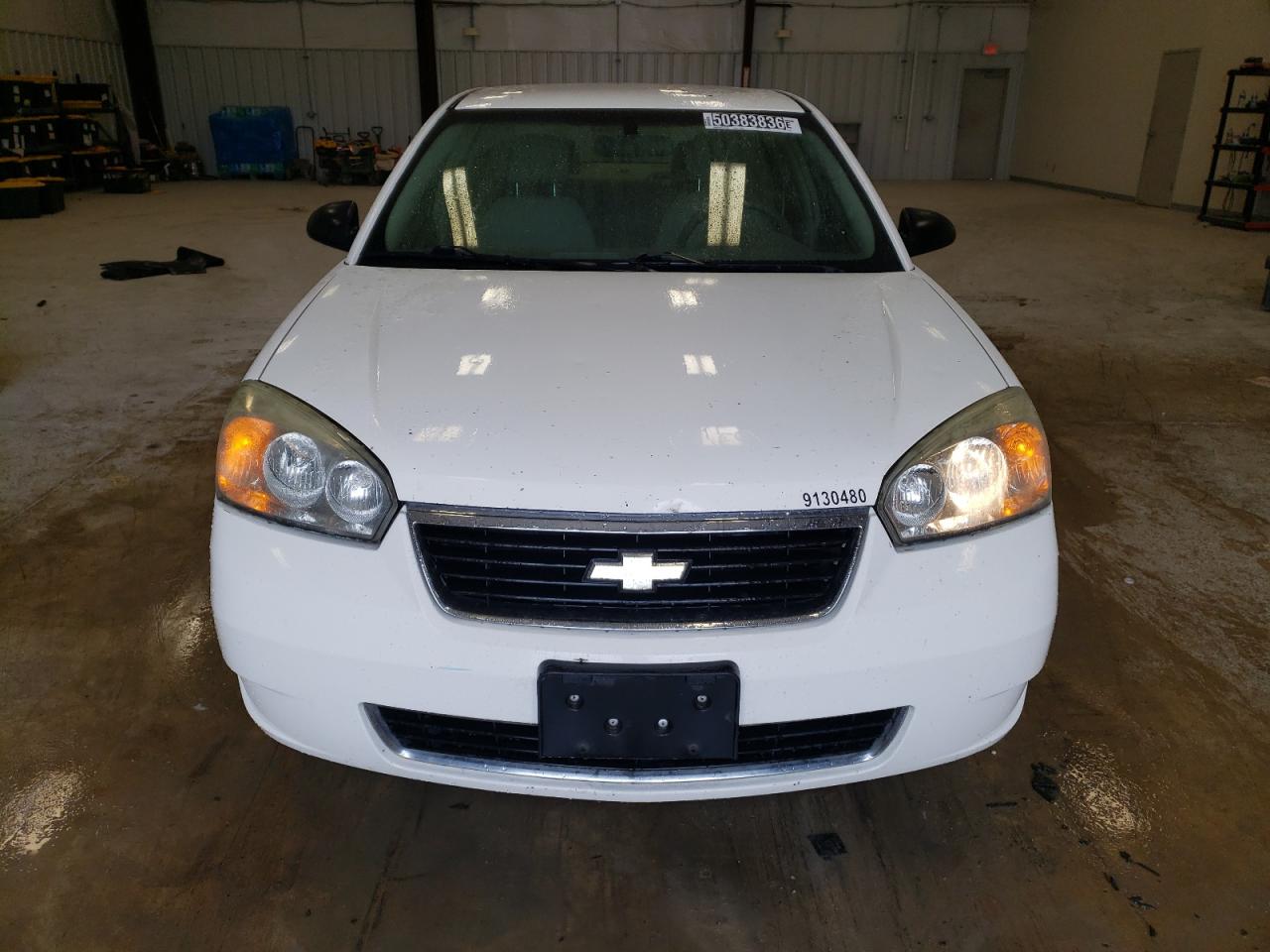 2007 Chevrolet Malibu Ls White vin: 1G1ZS58N37F292144 Damage: Left Head Lamp, Faded, Repair Required