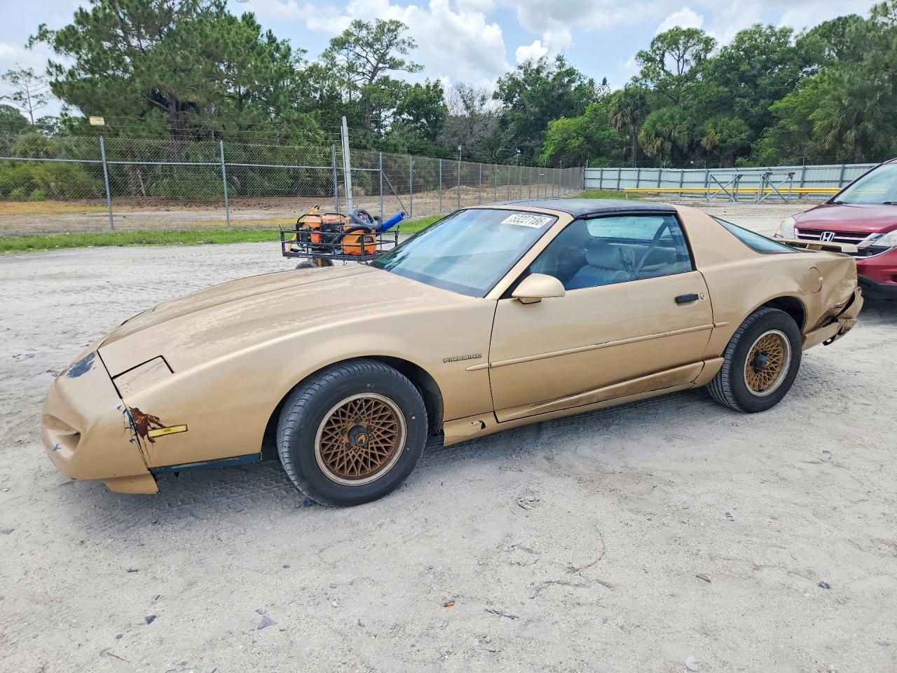 1992 Pontiac Firebird Base Золотой vin: 1G2FS23EXNL214396